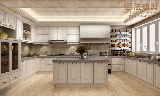 Lemari dapur modern stainless steel putih dengan panel pintu profil dan pegangan emas